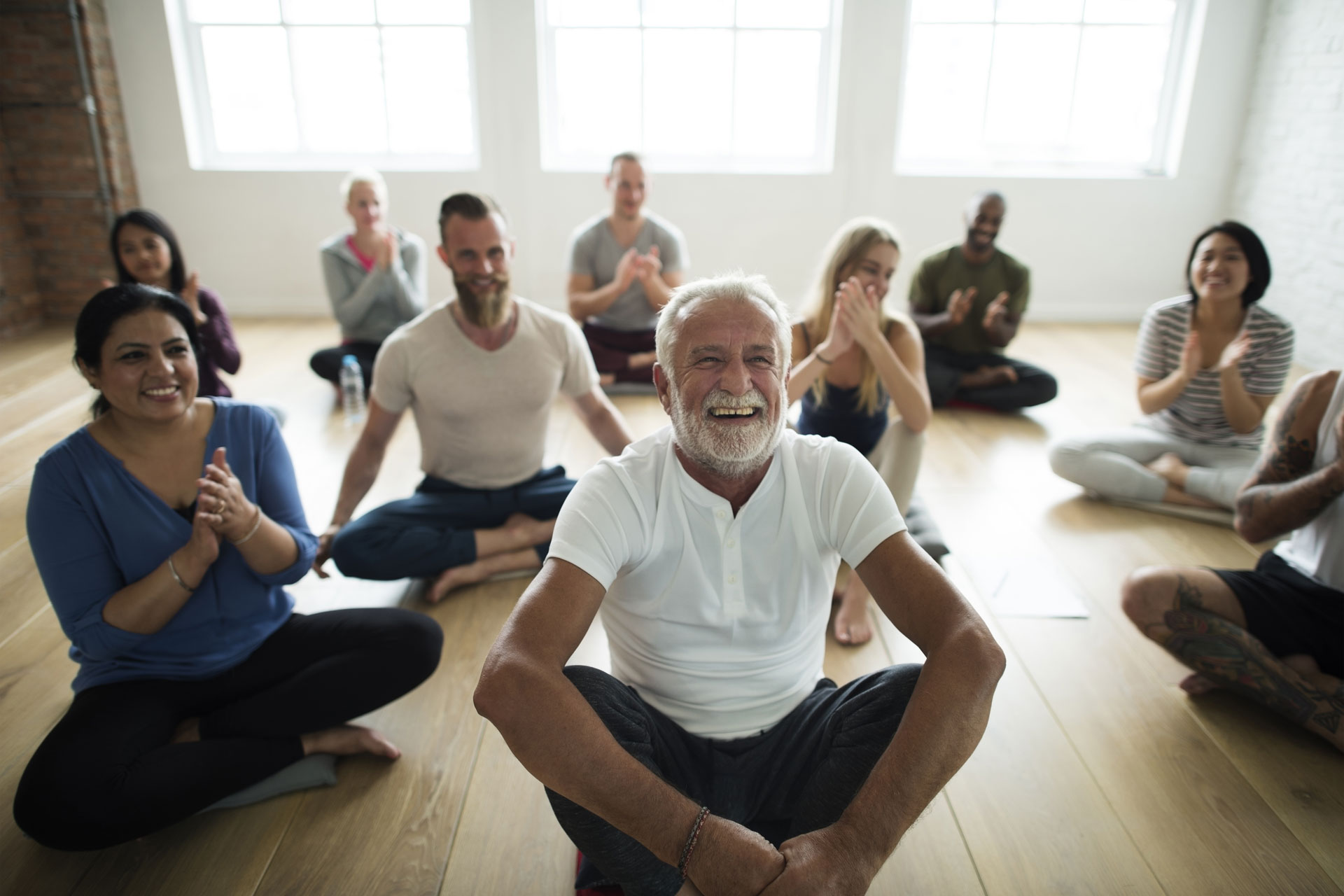 shutterstock_521856145-yoga-mixed-age-group.jpg